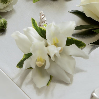 White Mini Cymbidium Boutonniere –  Lovely Flowers And Gifts, Islip Terrace NY